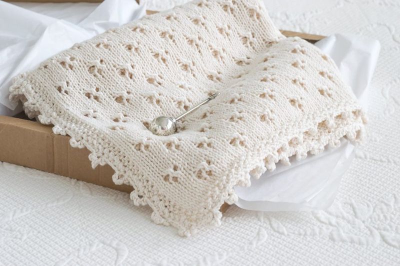 Cloverleaf Eyelet Baby Blanket free crochet pattern by Nourish and Nestle